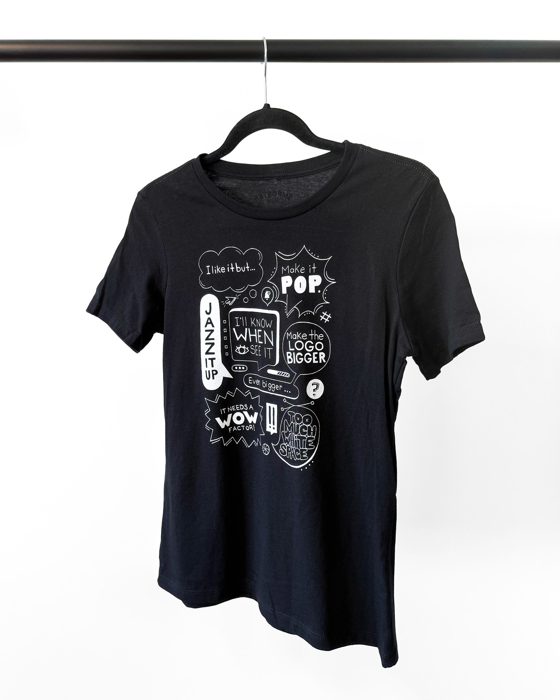 Black t-shirt with white graphic design on a hanger against a white background